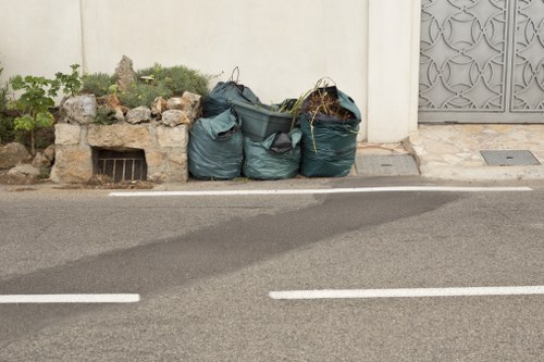 Professionals organizing a Bermondsey garage during clearance