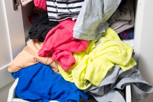 Workers measuring cubic-yard volume of garden debris